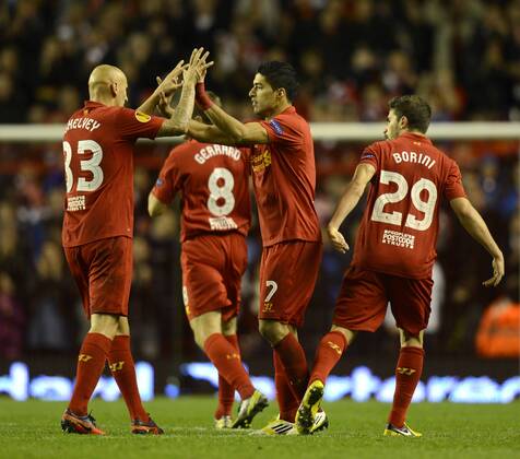 Luis Suarez of Liverpool celebrates scoring - UEFA Europa League Group A - Liverpool vs Udinese - Anfield Stadium - Liverpool - 04 10 12 - Picture Simon Bellis Sportimage EDITORIAL USE ONLY. No use with unauthorised audio, video, data, fixture lists, club league logos or live services. Online in-match use limited to 120 images, no video emulation. No use in betting, games or single club league player publications.