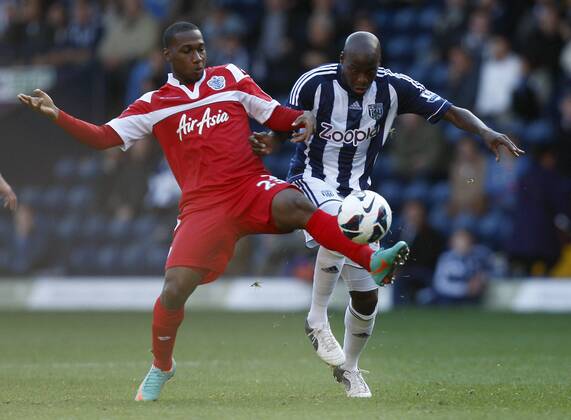 Football -Premier League- West Bromwich Albion v Queens Park Rangers QPR-Queens Park Rangers Junior Hoilett and West Broms Youssouf Mulumbu battle at The Hawthorns
