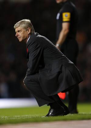 Arsenal s Arsene Wenger looks on..Barclays Premier League - West Ham United vs Arsenal FC London - Upton Park Stadium - London - 06 10 12 - Picture David Klein Sportimage EDITORIAL USE ONLY. No use with unauthorised audio, video, data, fixture lists, club league logos or live services. Online in-match use limited to 120 images, no video emulation. No use in betting, games or single club league player publications.