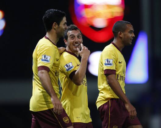 Arsenal s Santi Cazorla celebrates scoring his sides third goal..Barclays Premier League - West Ham United vs Arsenal FC London - Upton Park Stadium - London - 06 10 12 - Picture David Klein Sportimage EDITORIAL USE ONLY. No use with unauthorised audio, video, data, fixture lists, club league logos or live services. Online in-match use limited to 120 images, no video emulation. No use in betting, games or single club league player publications.