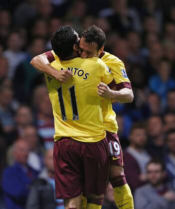 Arsenal s Santi Cazorla celebrates scoring his sides third goal..Barclays Premier League - West Ham United vs Arsenal FC London - Upton Park Stadium - London - 06 10 12 - Picture David Klein Sportimage EDITORIAL USE ONLY. No use with unauthorised audio, video, data, fixture lists, club league logos or live services. Online in-match use limited to 120 images, no video emulation. No use in betting, games or single club league player publications.