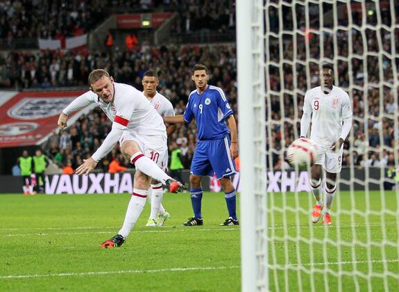 England s Wayne Rooney scoring his sides opening goal..England v San Marino - FIFA World Cup Qualifier - Wembley Stadium- 12 10 12 - Picture David Klein Sportimage EDITORIAL USE ONLY. No use with unauthorised audio, video, data, fixture lists, club league logos or live services. Online in-match use limited to 120 images, no video emulation. No use in betting, games or single club league player publications.