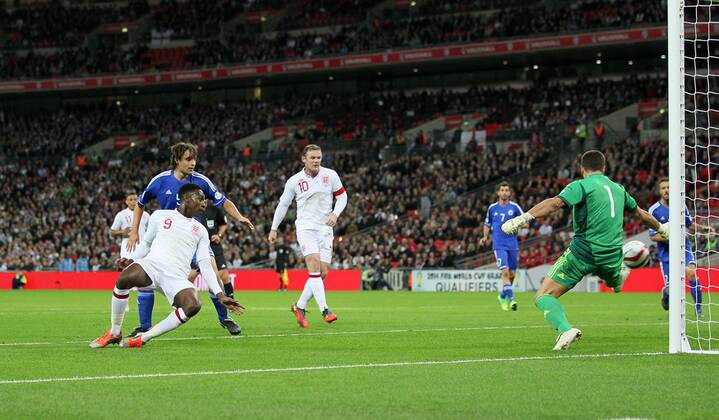 England s Danny Welbeck scoring his sides second goal..England v San Marino - FIFA World Cup Qualifier - Wembley Stadium- 12 10 12 - Picture David Klein Sportimage EDITORIAL USE ONLY. No use with unauthorised audio, video, data, fixture lists, club league logos or live services. Online in-match use limited to 120 images, no video emulation. No use in betting, games or single club league player publications.