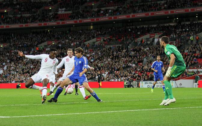 England s Danny Welbeck scoring his sides second goal..England v San Marino - FIFA World Cup Qualifier - Wembley Stadium- 12 10 12 - Picture David Klein Sportimage EDITORIAL USE ONLY. No use with unauthorised audio, video, data, fixture lists, club league logos or live services. Online in-match use limited to 120 images, no video emulation. No use in betting, games or single club league player publications.