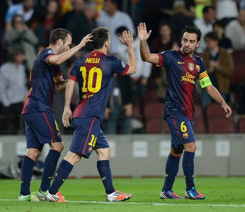 FUSSBALL INTERNATIONAL CHAMPIONS LEAGUE 2012 2013 FC Barcelona - Celtic FC Glasgow 23.10.2012 JUBEL Barca nach dem Tor zum 1-0 Torschütze Andres Iniesta, Lionel Messi und Xavi Hernandez (v.li.) 