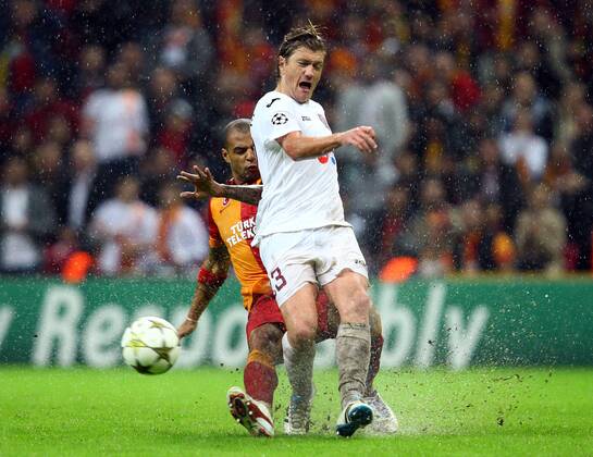 UEFA Champions league group H soccer match between Galatasaray v CFR Cluj at Turk Telekom Arena Stadium in Istanbul, Turkey. 23.10.2012 Match Scored: Galatasaray 1 - CFR Cluj 1 Pictured: Felipe Melo (L) of Galatasaray and Nicolas Godemeche of Cluj. 