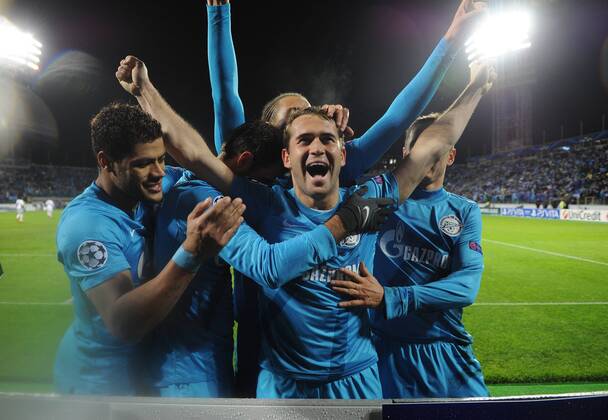 ST. PETERSBURG, RUSSIA. OCTOBER 24, 2012. FC Zenit s Alexander Kerzhakov (C) celebrates after scoring a goal during a UEFA Champions League game vs. Anderlecht in St Petersburg.  RE10BA6B