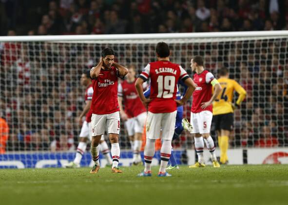 Arsenal s Mikel Arteta looks on dejected after going 1-0 down..Arsenal London vs FC Schalke 04 - Champions League Group Match - The Emirates Stadium, London- 24 10 12 - EDITORIAL USE ONLY. No use with unauthorised audio, video, data, fixture lists, club league logos or live services. Online in-match use limited to 120 images, no video emulation. No use in betting, games or single club league player publications.