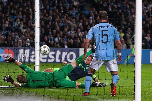 Football - 2012 2013 Champions League - Manchester City vs. Ajax Siem de Jong of Ajax scores the opening goal at the Etihad Stadium 