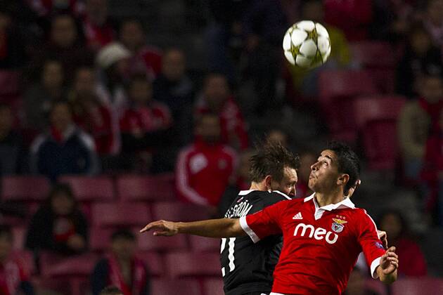 7 November 2012 - Lisbon, Portugal - Kim Kallstrom FC Spartak Moskva midfielder (L) and Andre Almeida SL Benfica defender (R) during the UEFA Champions League soccer match between SL Benfica from Portugal and FC Spartak Moskva from Russia, for group stage - group G, at SL Benfica, Luz Satadium in Lisbon. 