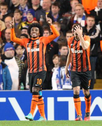 07.11.2012. London, England. Willian of FC Shakhtar Donetsk celebrates with Darijo Srna of FC Shakhtar Donetsk as he scores his teams equaliser during the UEFA Champions League Group E game between Chelsea and Shakhtar Donetsk from Stamford Bridge xKieranxGalvinx  ActionPlus11345012
