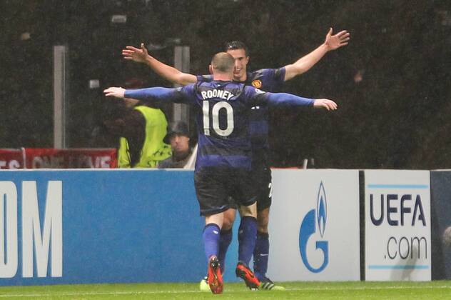 Rooney and Van Persie of Manchester United celebrate Van Persie goal during the UEFA Champions League match against SC Braga, at Estadio Axa in Braga, Portugal