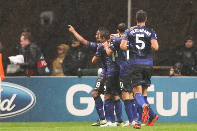 Manchester United players celebrate the second goal of a 3-1 victory over SC Braga during the UEFA Champions League match at Estadio Axa in Braga, Portugal