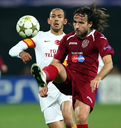 UEFA Champions league group H soccer match between CFR Cluj v Galatasaray at Dr.Constantin Radulescu Stadium in Cluj, Rumania. 07.11.2012 Match Scored: CFR Cluj 1 - Galatasaray 3 Pictured: Umut Bulut (back) of Galatasaray and Felice Piccolo of Cluj. 