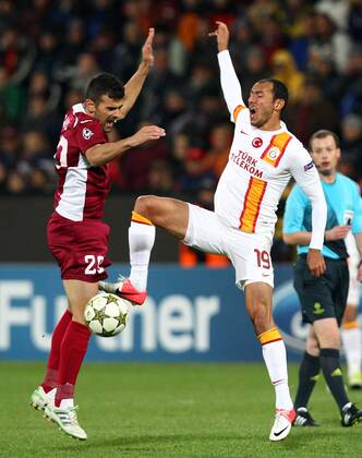 UEFA Champions league group H soccer match between CFR Cluj v Galatasaray at Dr.Constantin Radulescu Stadium in Cluj, Rumania. 07.11.2012 Match Scored: CFR Cluj 1 - Galatasaray 3 Pictured: Umut Bulut of Galatasaray and Ricardo Cadu (20) of Cluj. 