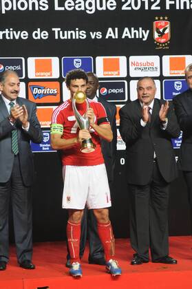 Nov. 17, 2012 - TUNIS, Tunisia - The team captain Hossam Ghaly Al Ahly who holds the African Cup after the victory of his team. .Al Ahly of Egypt won the African Champions League football in 2012 beating Esperance Sportive de Tunis defending champion with a score of 2-1 in the Final return Rades stadium. Al Ahly (Egypt) won the African Champions League in Tunis.  - ZUMAm10