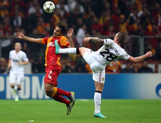 UEFA Champions league group H soccer match between Galatasaray v Manchester United at Turk Telekom Arena Stadium in Istanbul, Turkey on 20.11.2012 Pictured: Alexander Büttner of Manchester United and Hamit Altintop of Galatasaray. 