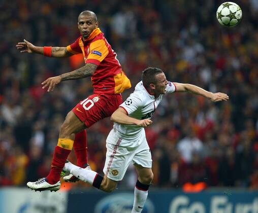 UEFA Champions league group H soccer match between Galatasaray v Manchester United at Turk Telekom Arena Stadium in Istanbul, Turkey on 20.11.2012 Pictured: Felipe Melo of Galatasaray and Tom Cleverley of Manchester United. 