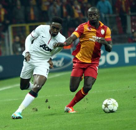Dany Nounkeu (R) of Galatasaray challanged for the ball with Rafael (L) of Manchester United during Champions League Group H match between Galatasaray and Manchester United at Ali Sami Yen Sports Complex in Istanbul . Turkey 20.11.2012 Photo:Ali OZLUER Seskimphoto 