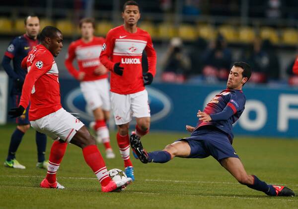 UEFA Champions League 2012 13 between FC Spartak (Moscow, Russia) and FC Barcelona (Barcelona, Barca).UEFA Champions League 2012 13 between FC Spartak (Moscow, Russia) and FC Barcelona (Barcelona, Barca). Sergio Busquets - Emmanuel Emenike
