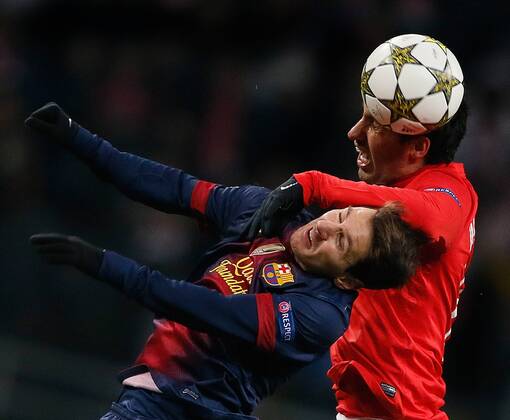 UEFA Champions League 2012 13 between FC Spartak (Moscow, Russia) and FC Barcelona (Barcelona, Barca).UEFA Champions League 2012 13 between FC Spartak (Moscow, Russia) and FC Barcelona (Barcelona, Barca). Lionel Messi - Juan Insaurralde.