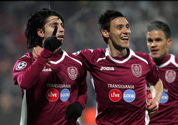 20.11.2012 Cluj-Napoca(Romania) FC CFR Cluj-SC Sporting Braga UEFA Champions League men football Rui Pedro(L) with Mario Camora(r) FC CFR Cluj celebration :Stringer in cooperation with 