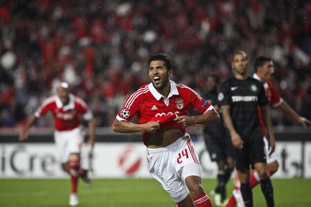 20 November 2012 - Lisbon, Portugal - Ezequiel Garay SL Benfica defender celebrating his goal which set the final result by 2-0 at the UEFA Champions League soccer match between SL Benfica from Portugal and Celtic FC from Scotland, for group stage - group G, at SL Benfica, Luz Satadium in Lisbon. 