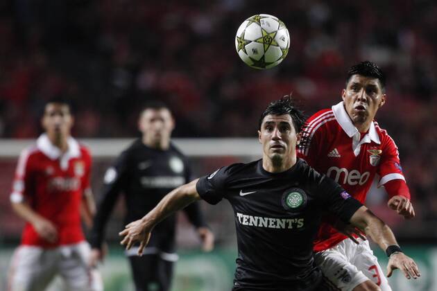 20 November 2012 - Lisbon, Portugal - Beram Kayal Celtic FC midfielder (L) and Enzo Perez SL Benfica midfielder (R) during the UEFA Champions League soccer match between SL Benfica from Portugal and Celtic FC from Scotland, for group stage - group G, at SL Benfica, Luz Satadium in Lisbon. 