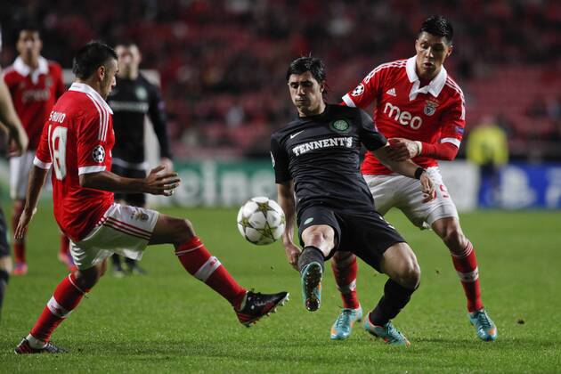 20 November 2012 - Lisbon, Portugal - Eduardo Salvio SL Benfica forward (L), Beram Kayal Celtic FC midfielder (C) and Enzo Perez SL Benfica midfielder (R) during the UEFA Champions League soccer match between SL Benfica from Portugal and Celtic FC from Scotland, for group stage - group G, at SL Benfica, Luz Satadium in Lisbon. 