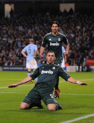 Karim Benzema of Real Madrid celebrates scoring the first goal - UEFA Champions League Group D - Manchester City vs Real Madrid - Etihad Stadium - Manchester - 21 11 12 - EDITORIAL USE ONLY. No use with unauthorised audio, video, data, fixture lists, club league logos or live services. Online in-match use limited to 120 images, no video emulation. No use in betting, games or single club league player publications.