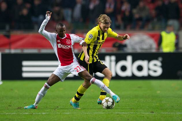 (L-R) Jody Lukoki of Ajax, Marcel Schmelzer of Borussia Dortmund during the Champions League match between Ajax Amsterdam and Borussia Dortmund at the Amsterdam Arena on November 21, 2012 in Amsterdam - Ajax Amsterdam v Borussia Dortmund Champions League 2012 2013 xVIxxIVx 1258453