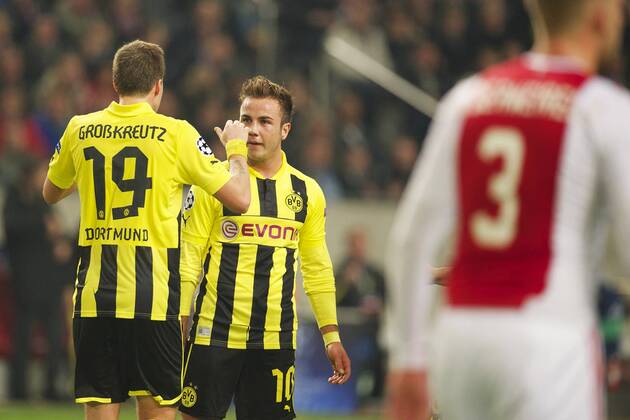 (L-R) Kevin Grosskreutz of Borussia Dortmund, Mario Götze of Borussia Dortmund during the Champions League match between Ajax Amsterdam and Borussia Dortmund at the Amsterdam Arena on November 21, 2012 in Amsterdam - Ajax Amsterdam v Borussia Dortmund Champions League 2012 2013 xVIxWillemxJanxDijkdrentxIVx 1258861