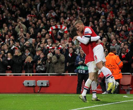Arsenal s Lukas Podolski celebrates scoring his sides second goal. FC Arsenal London v HSC Montpellier -Champions League- Emirates Stadium, London- 21 11 12 - Picture DavidxKlein Sportimage EDITORIAL USE ONLY. No use with unauthorised audio, video, data, fixture lists, club league logos or live services. Online in-match use limited to 120 images, no video emulation. No use in betting, games or single club league player publications.