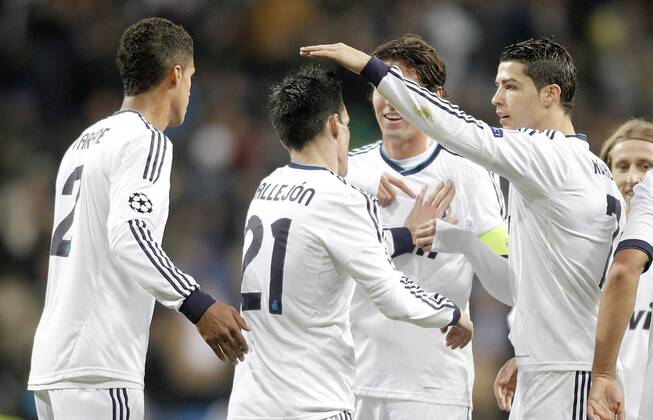 Real Madrid s Jose Callejon celebrates with Cristiano Ronaldo during Champions League Match. December 04, 2012.  (20134038)