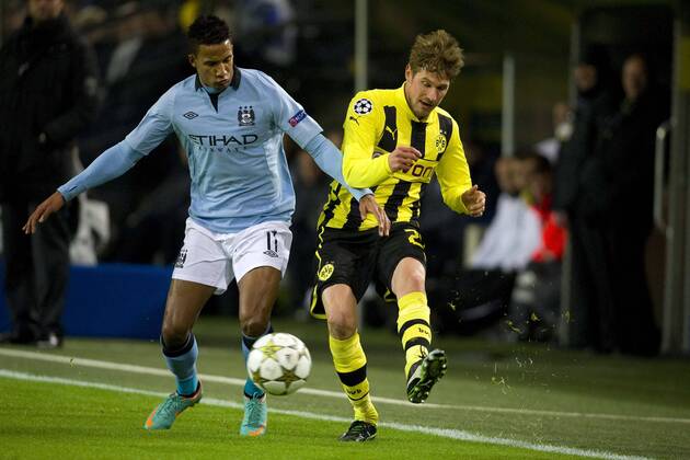 Scott SINCLAIR (li., ManCity) gegen Oliver KIRCH (DO), Aktion, Zweikampf, Fussball Champions League, Vorrunde 6. Spieltag, Borussia Dortmund (DO) - Manchester City (ManCity), am 04.12.2012 in Dortmund Deutschland