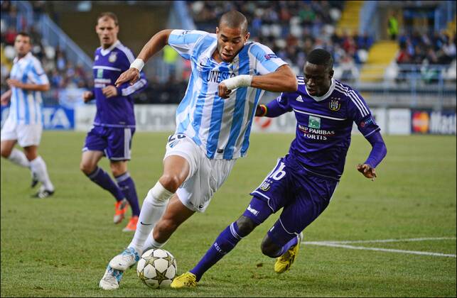 Oguchi Onyewu of Malaga - Cheikhou Kouyate of RSC Anderlecht FOOTBALL : Malaga vs Anderlecht - Ligue des Champions - 04 12 2012 Photonews Panoramic 