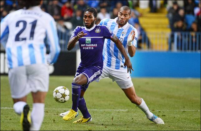 Oguchi Onyewu of Malaga and Dieumerci Mbokani of RSC Anderlecht FOOTBALL : Malaga vs Anderlecht - Ligue des Champions - 04 12 2012 Photonews Panoramic 