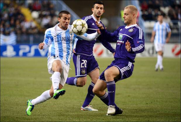 Seba of Malaga and Olivier Deschacht of RSC Anderlecht FOOTBALL : Malaga vs Anderlecht - Ligue des Champions - 04 12 2012 Photonews Panoramic 