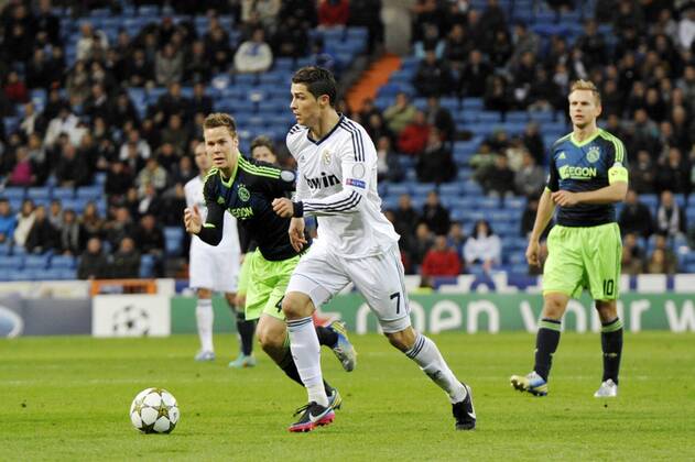 Real Madrid - Ajax - UEFA Champions League 2012 2013 - Group D - Matchday 6 Cristiano Ronaldo; Moisaden and De Jong Estadio Santiago Bernabeu - Madrid - Spain- 04 12 2012 