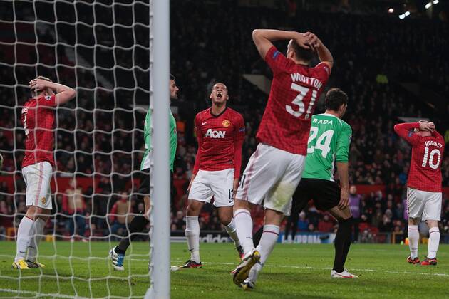 Football - 2012 2013 Champions League - Group H: Manchester United vs. CFR Cluj Chris Smalling of Manchester United reacts to a missed chance at Old Trafford 