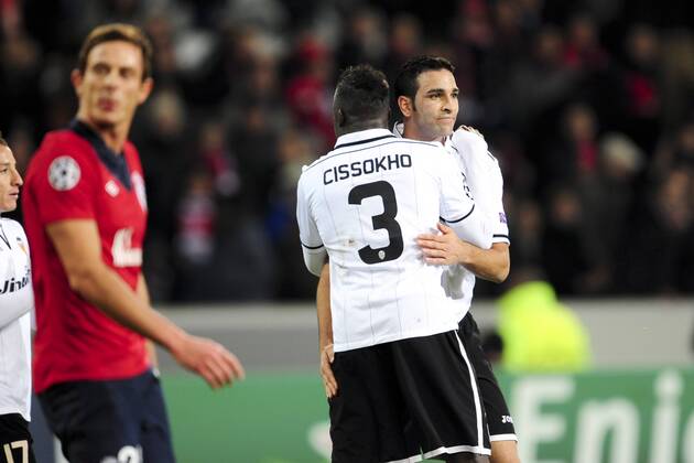 Adil Rami et Aly Cissokho (Fc Valence) en fin de Match FOOTBALL : Lille vs Fc Valence - Ligue des Champions - 05 12 2012 JBAutissier Panoramic 
