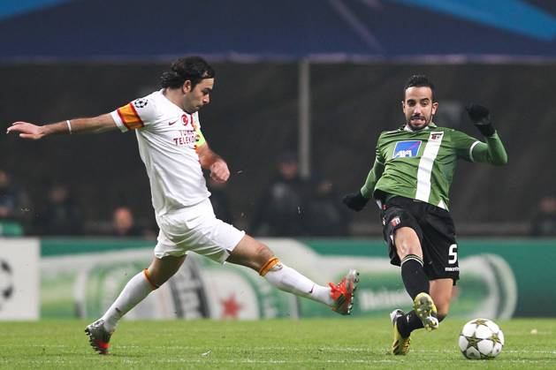 Ruben Amorim (R) of SC Braga (Sporting) challenges Selcuk Inam of Galatasaray during the UEFA Champions League, Group H match at AXa Stadium in Braga.