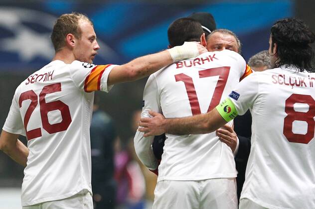 Burak, Galatasaray player celebrates his goal with team mates and coach Fatih Terim, which set the 1-1 score at 58 , against SC Braga (Sporting) .