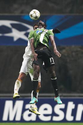 Eder of SC Braga (Sporting) challenges Riera of Galatasaray during the UEFA Champions League, Group H match at AXa Stadium in Braga.