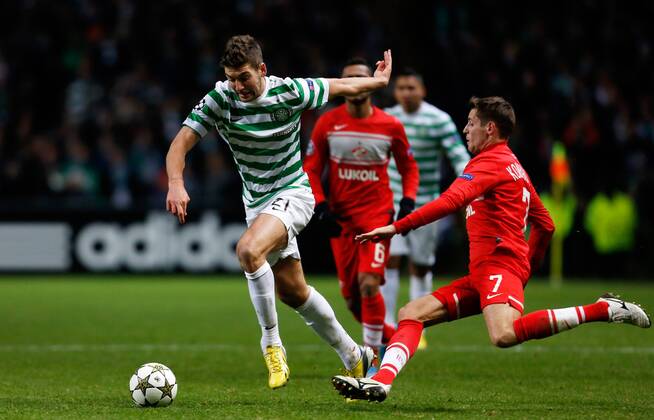 Charlie Mulgrew (L) of Celtic in action with Kirill Kombarov of Spartak Moscow - UEFA Champions League group G - Celtic vs Spartak Moscow - Celtic Park - Glasgow - Scotland - 5th September 2012 EDITORIAL USE ONLY. No use with unauthorised audio, video, data, fixture lists, club league logos or live services. Online in-match use limited to 120 images, no video emulation. No use in betting, games or single club league player publications.