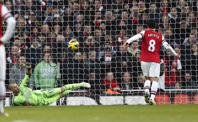 Arsenal s Mikel Arteta scoring his sides opening goal from the penalty spot..Arsenal FC London v West Bromwich Albion - Premier League - Emirates Stadium, London- 8 12 12 - Picture David Klein Sportimage EDITORIAL USE ONLY. No use with unauthorised audio, video, data, fixture lists, club league logos or live services. Online in-match use limited to 120 images, no video emulation. No use in betting, games or single club league player publications.