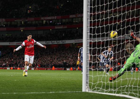 Arsenal s Mikel Arteta scoring his sides second goal from the penalty spot..Arsenal FC London v West Bromwich Albion - Premier League - Emirates Stadium, London- 8 12 12 - Picture David Klein Sportimage EDITORIAL USE ONLY. No use with unauthorised audio, video, data, fixture lists, club league logos or live services. Online in-match use limited to 120 images, no video emulation. No use in betting, games or single club league player publications.