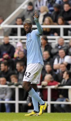 Yaya Toure of Manchester City celebrates scoring their third - Barclays Premier League - Newcastle United vs Manchester City - St. James Park - Newcastle - 15 12 12 - EDITORIAL USE ONLY. No use with unauthorised audio, video, data, fixture lists, club league logos or live services. Online in-match use limited to 120 images, no video emulation. No use in betting, games or single club league player publications.