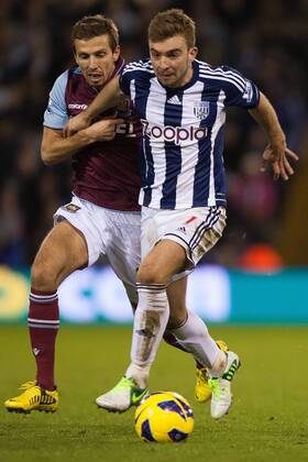 Football - 2012 2013 Premier League - West Bromwich Albion vs. West Ham United West Ham s Gary O Neil battles West Brom s James Morrison at The Hawthorns