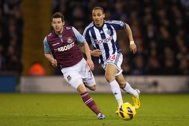 Football - 2012 2013 Premier League - West Bromwich Albion vs. West Ham United West Ham s Matt Jarvis and West Brom s Peter Odemwingie at The Hawthorns